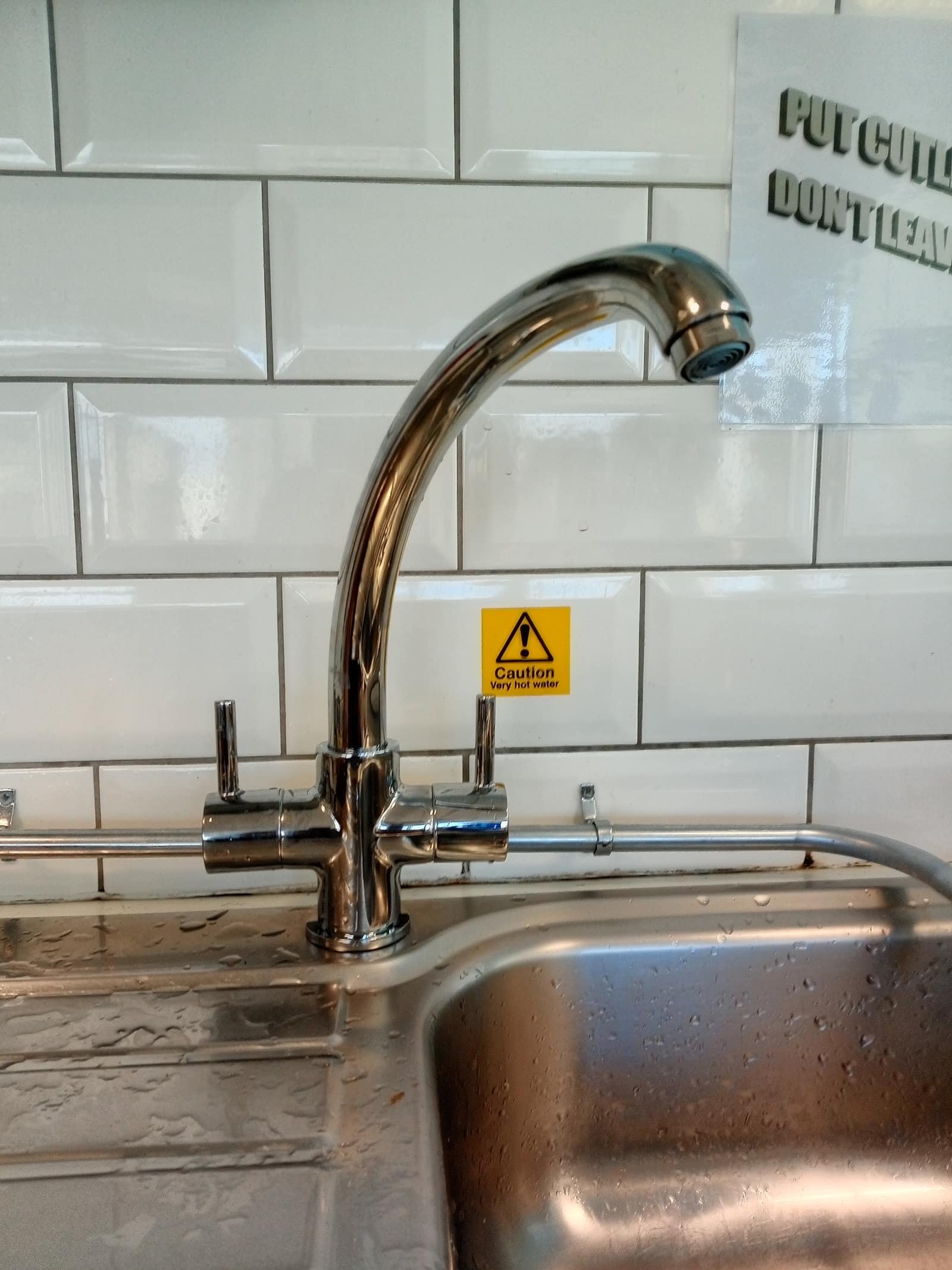 Black kitchen tap supplied and fitted